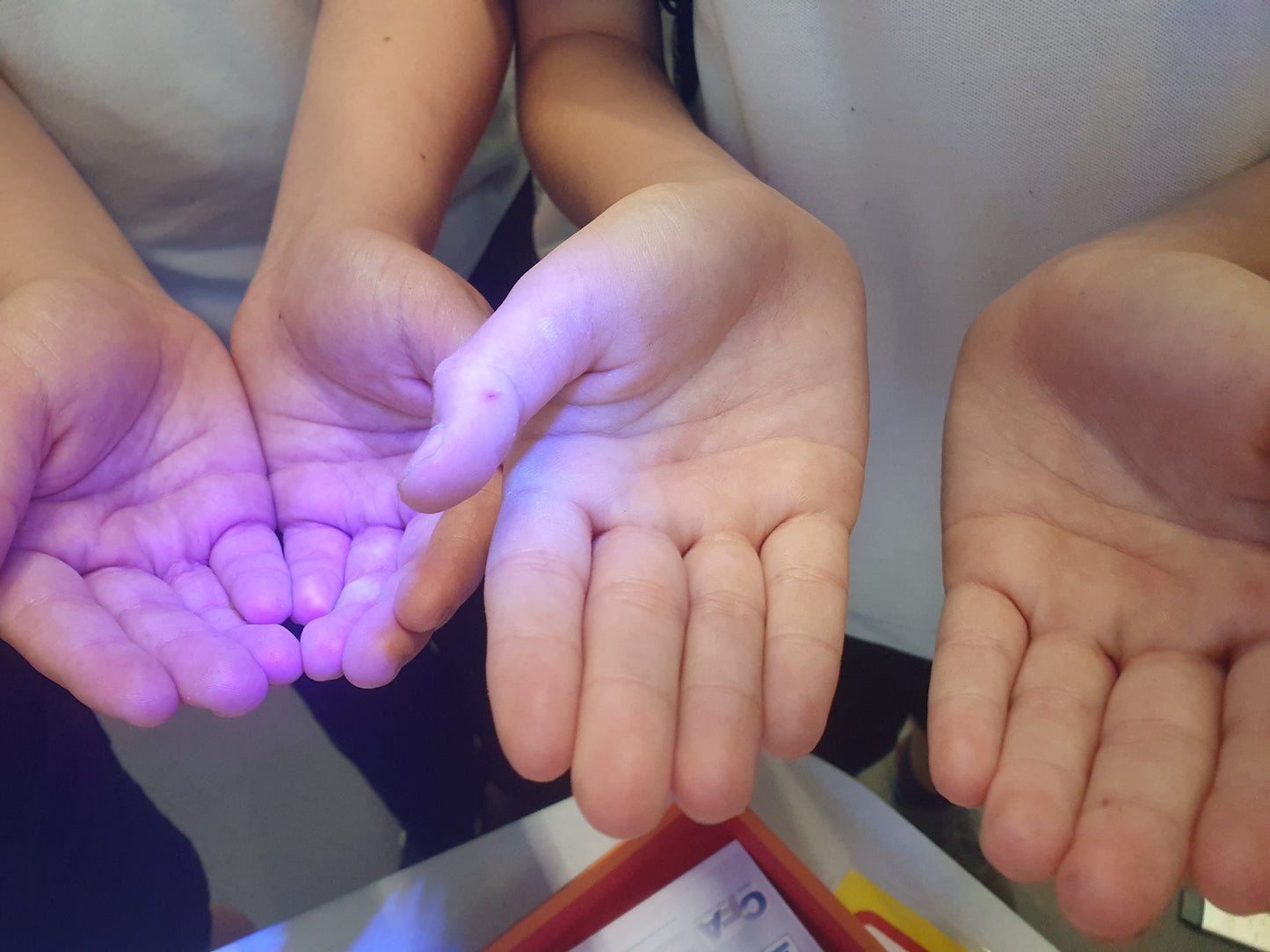 Using Glo Germ and UV torches to demonstrate handwashing